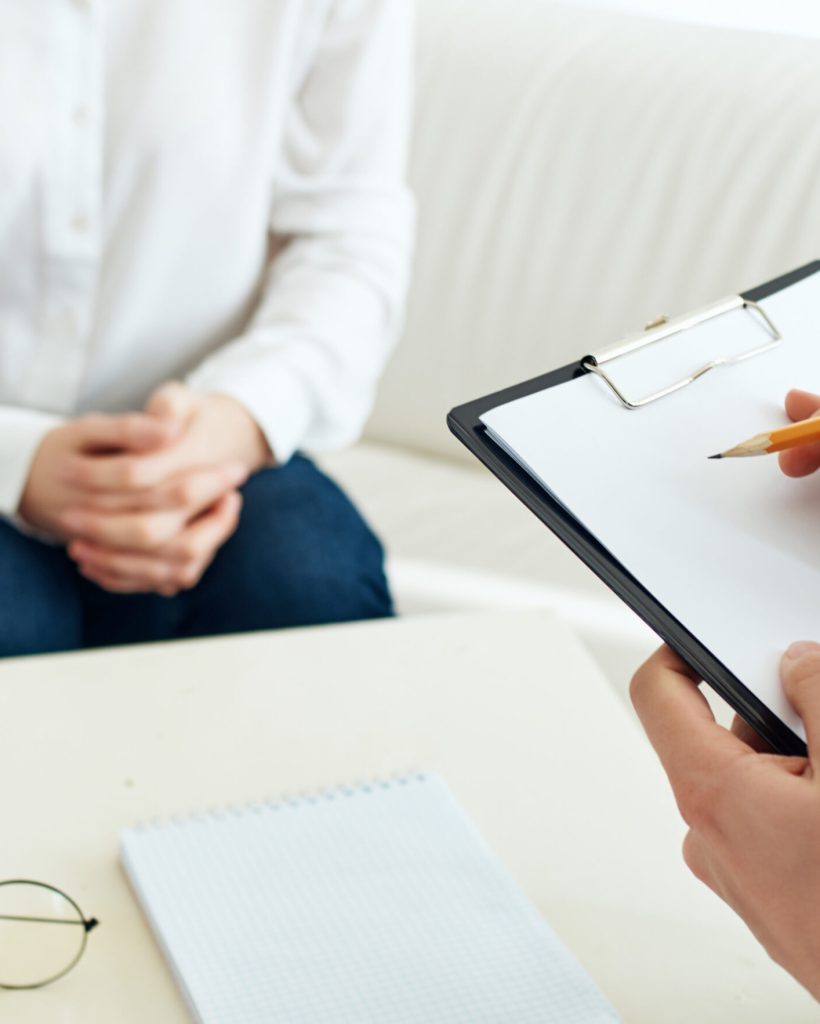 woman sitting psychologist health problems diagnosis treatment. High quality photo